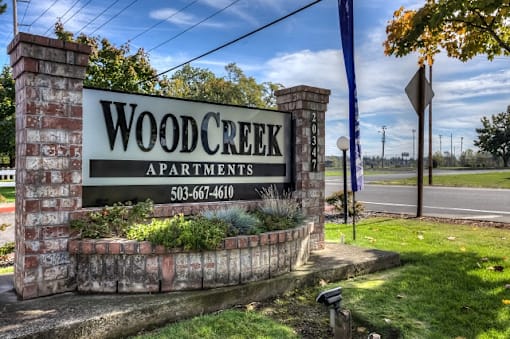 Property Signage at Woodcreek Apartments, Fairview
