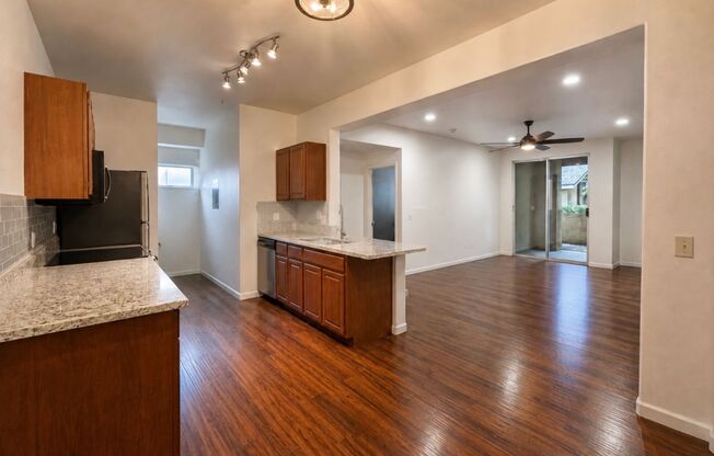 Move in Special 1/2 of one months Rent:Gated Reserves - 3 Bed, 2 Bath -Downstairs - Access to Pool, Gym, and More! 2 Assigned Parking