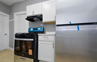 7556-58 S. Calumet Ave. / 320-28 E 76th St.