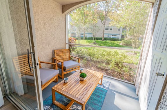 Patio Area at The Boot Ranch Apartments, Palm Harbor, 34685