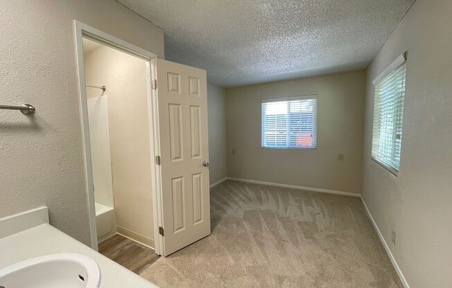 Includes Free Covered and Gated Parking Space!  $1,000 Moves You in Today!