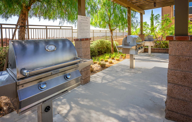 Covered outdoor area with bbq grills