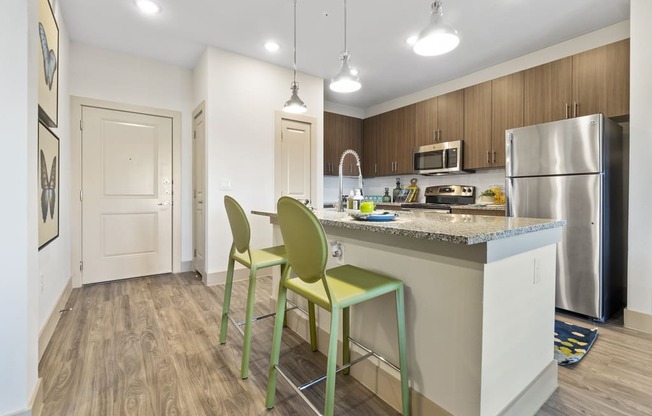 Gourmet Kitchen With Island at McCarty Commons, San Marcos