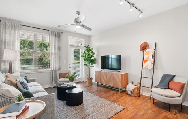 a living room with a couch and a tv