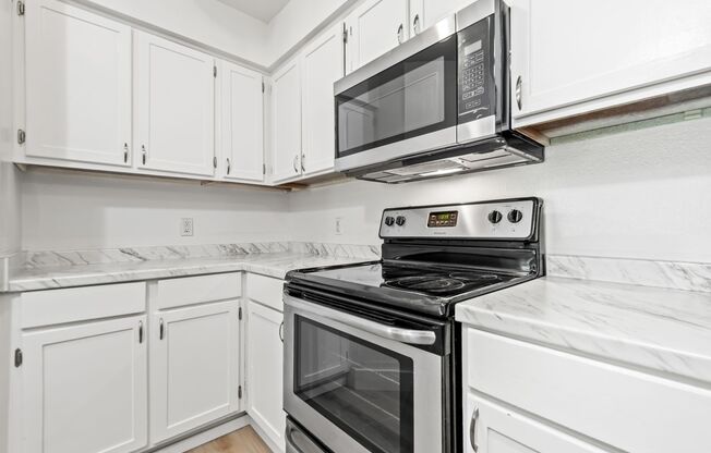 Cozy Modern 2-Bedroom Condo with Private Balcony & Fireplace