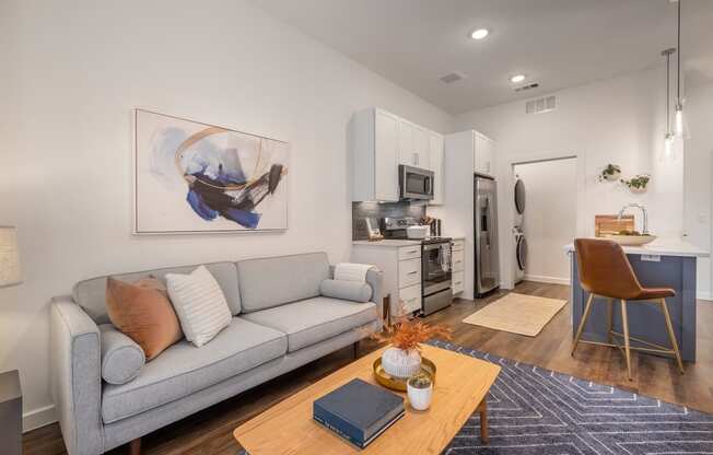 a living room with a couch and a coffee table