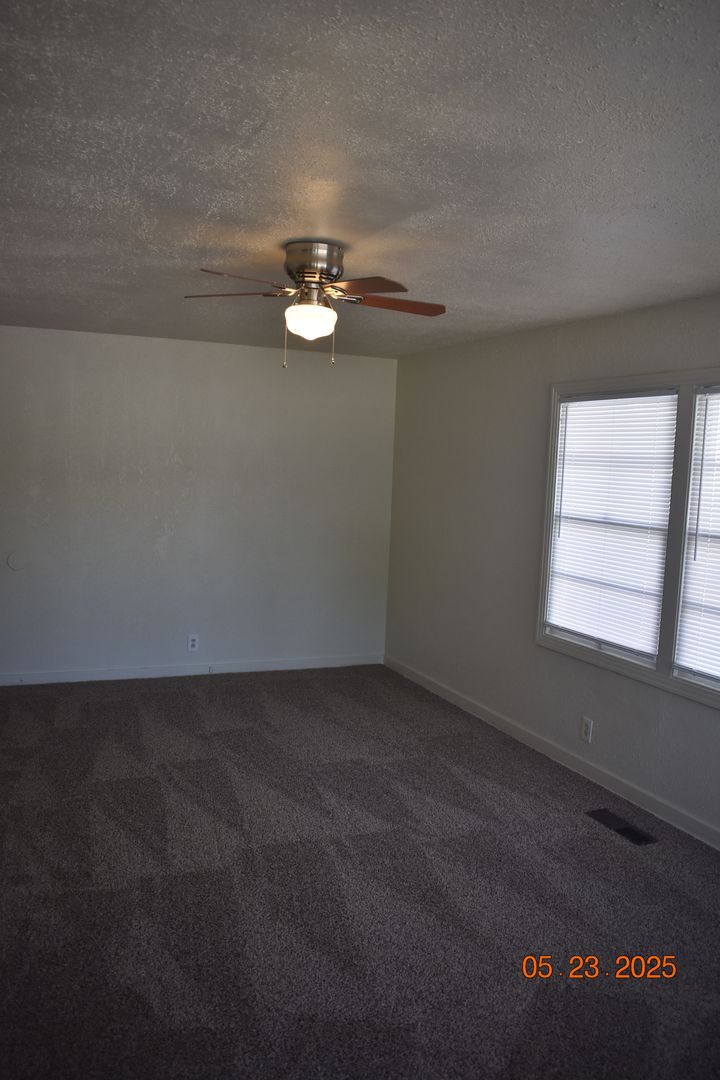Charming Three Bedroom Home with New Carpet/ Built-ins/ Miracle Mile