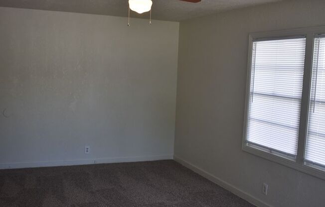 Charming Three Bedroom Home with New Carpet/ Built-ins/ Miracle Mile