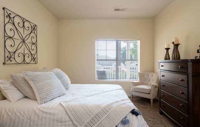 Bedroom with Large Window at Portico at Lanier located in Gainesville, GA 30504