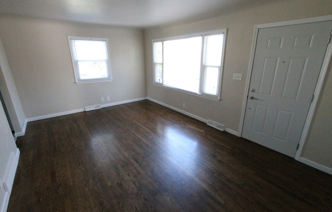 Look!  4 Bedroom with updates! Hardwood floors and Garage!