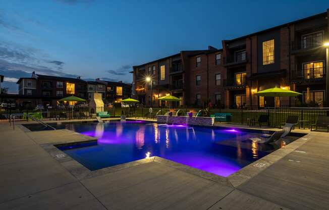 Resort-Style Pool & Sundeck At Night