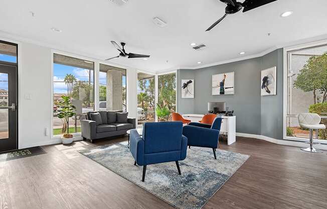 Community Clubhouse with Lounge Furniture at Crystal Creek Apartments in Phoenix, AZ.