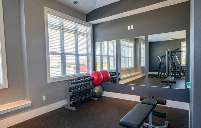 Free Weights In Gym at The Reserve at Destination Pointe, Iowa, 50111