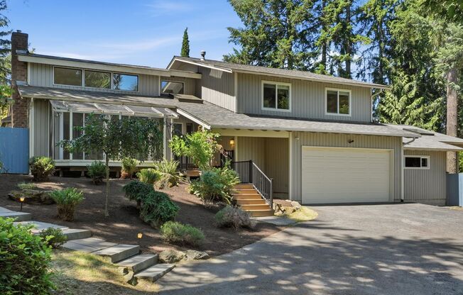 Spacious Tri-Level Home in West Lake Sammamish with Luxurious Features and Prime Location
