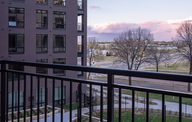 View over Mississippi river and entertaining terrace from apartment balcony