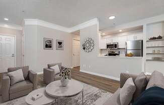 a living room with couches and a coffee table