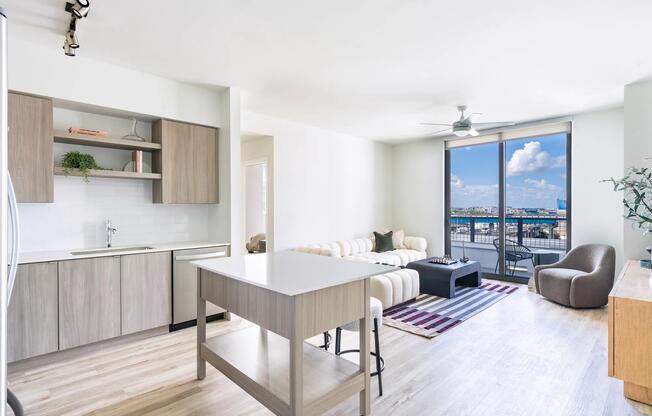 Open-concept living at Modera Riverside pairs sleek finishes with expansive Miami views.