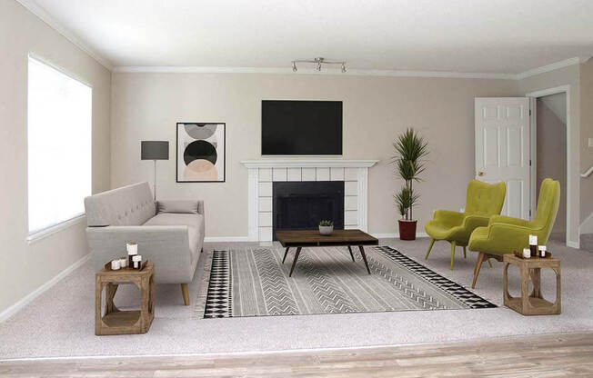 a living room with a couch and chairs and a television