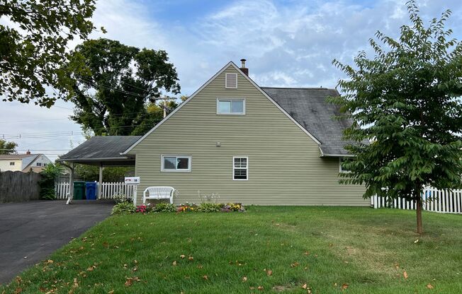 Welcome to this 4 bedroom 2 bath home in the Crabtree section of Levittown.