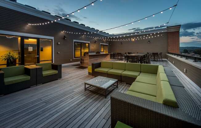 Outdoor couches on community roof deck | The Merc at Moody and Main