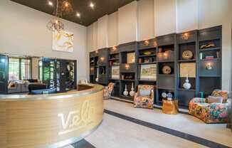 the lobby or reception area of vecchia velle apartments