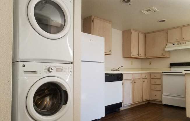 In-unit washer and dryer and kitchen at university west apartments in flagstaff az