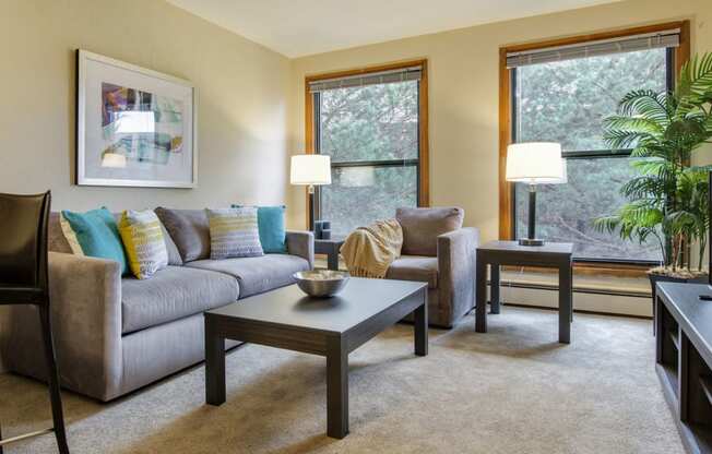 Living Room with Ample Lighting at Ridgewood Arches Apartments