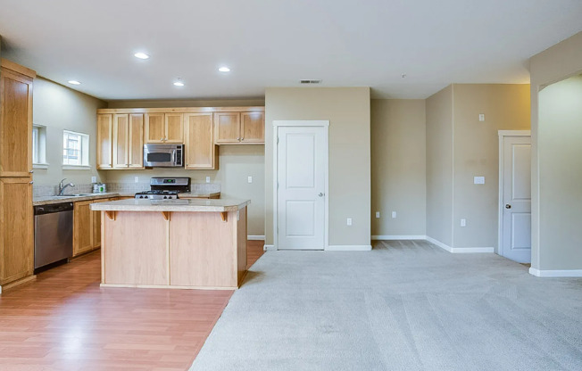 Charming 2-Bed Townhome in Sherwood with Pool Access, Garage, and Vaulted Ceilings!