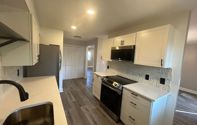 This fully renovated & updated 3 Bedroom and 2.5 Bath is Move-in Ready!