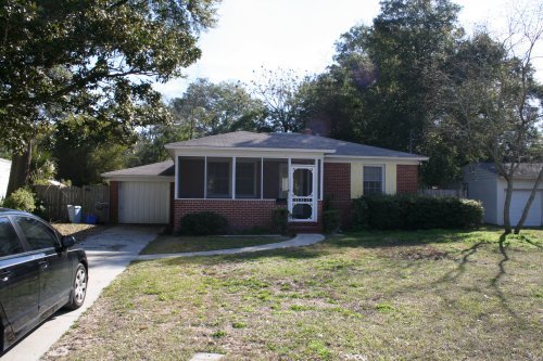 Cute  2 bedroom 1 bath Brick Bungalow with 1 car detached garage.