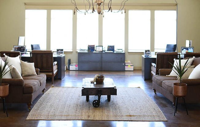 a living room with couches and a coffee table
