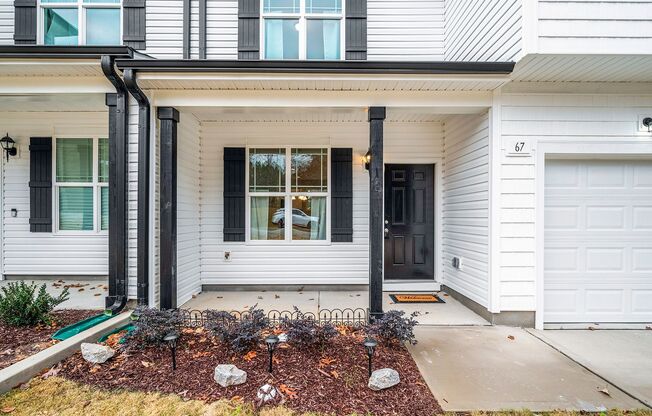MOVE IN READY! BRAND NEW 4 bedroom 2.5 bathroom townhome with GARAGE and WOODED VIEW!
