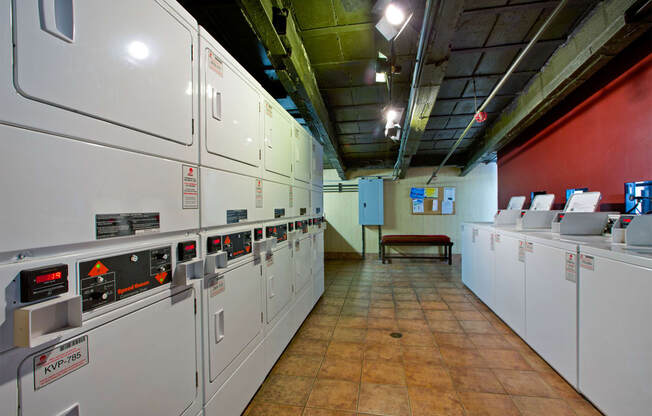 a room filled with lots of white utility machines