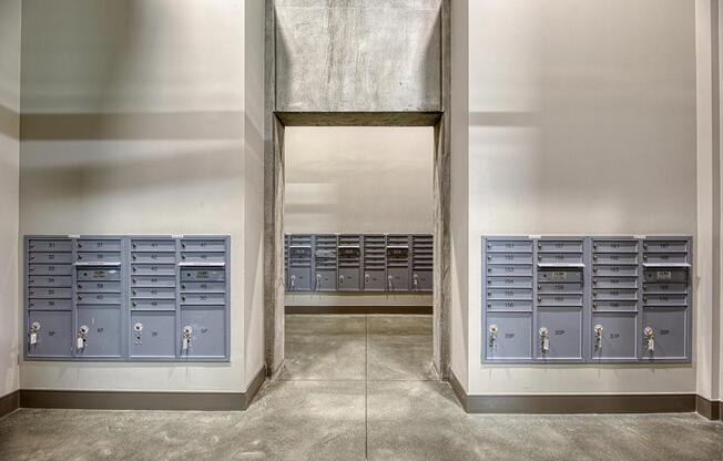 Mailroom hallway with organized mailboxes and clean, streamlined walls for easy mail access.