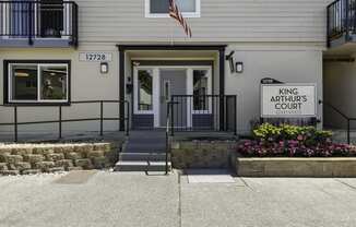 Front View of Property with Property Sign at King Arthurs Court, Seattle, WA