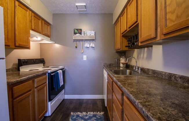 This is a photo of the kitchen in the 950 square foor, 2 bedroom apartment at Deer Hill Apartments in Cincinnati, OH.