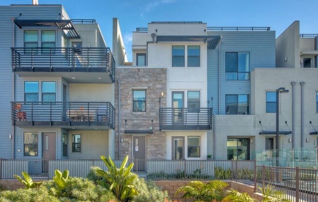 Downtown Oceanside Condo with pool and rooftop deck!