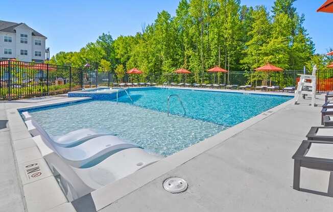 the reserve at city center spacious pool with chaise lounge chairs