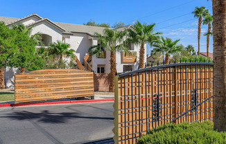 a gated community with palm trees