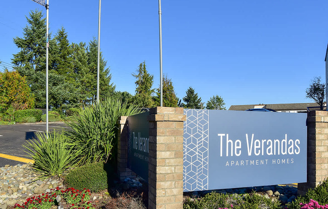 The Verandas Apartment Homes sign is displayed in front of a landscaped area.