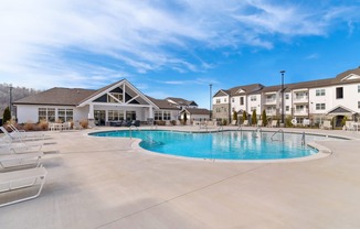Ashland Farms Expansive Swimming Pool Area with Sundeck and Shaded Table Seating