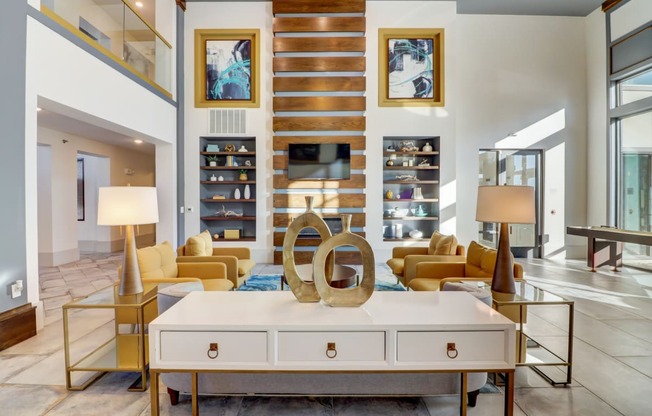 a living room with couches and a coffee table