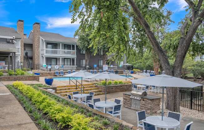 the preserve at ballantyne commons courtyard with tables and umbrellas