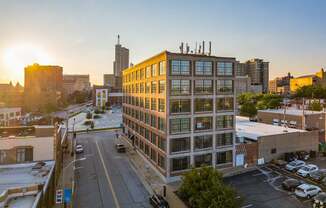 A sunset view of PW Shoe Loft Apartments