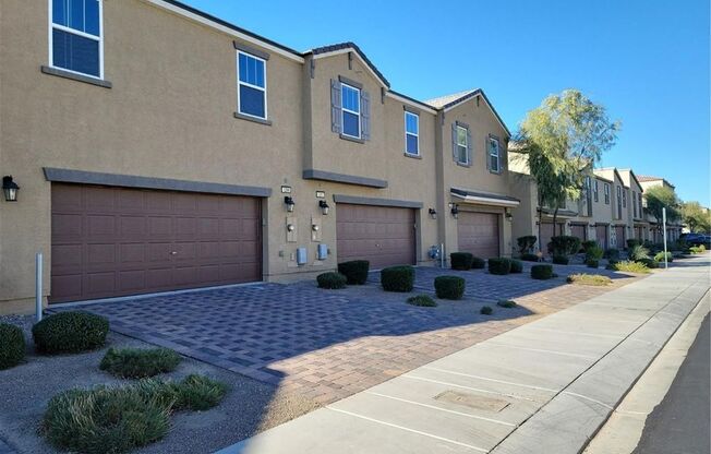 Modern Henderson Townhome with First-Floor Primary Suite & Mountain Views!