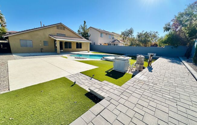 Gorgeous recently renovated single story 4 bedroom home on a large lot with a pool in the Southern Highlands community!