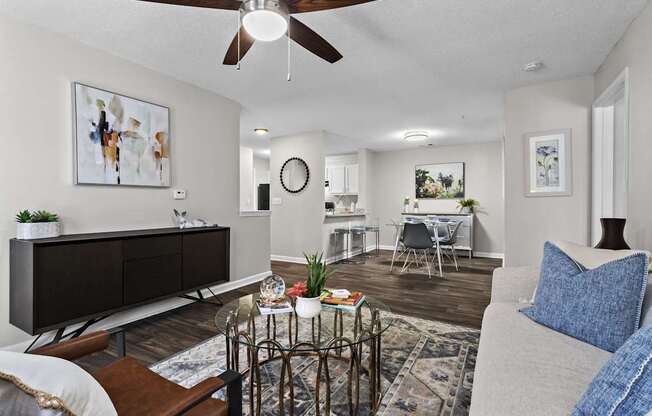 A living room with a brown and white color scheme.