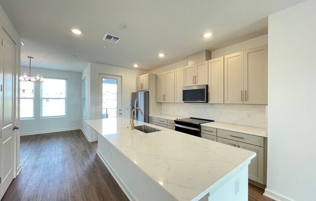 3 Bedroom, 3.5 Bath Townhome with 2 Car Garage and Water Views!