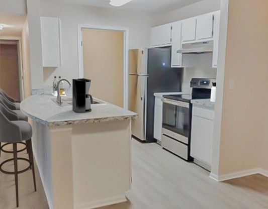 Cook and entertain in style with our contemporary kitchens, featuring sleek countertops, modern appliances, and ample cabinetry for all your culinary needs.