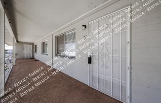 6841 E 2 ST